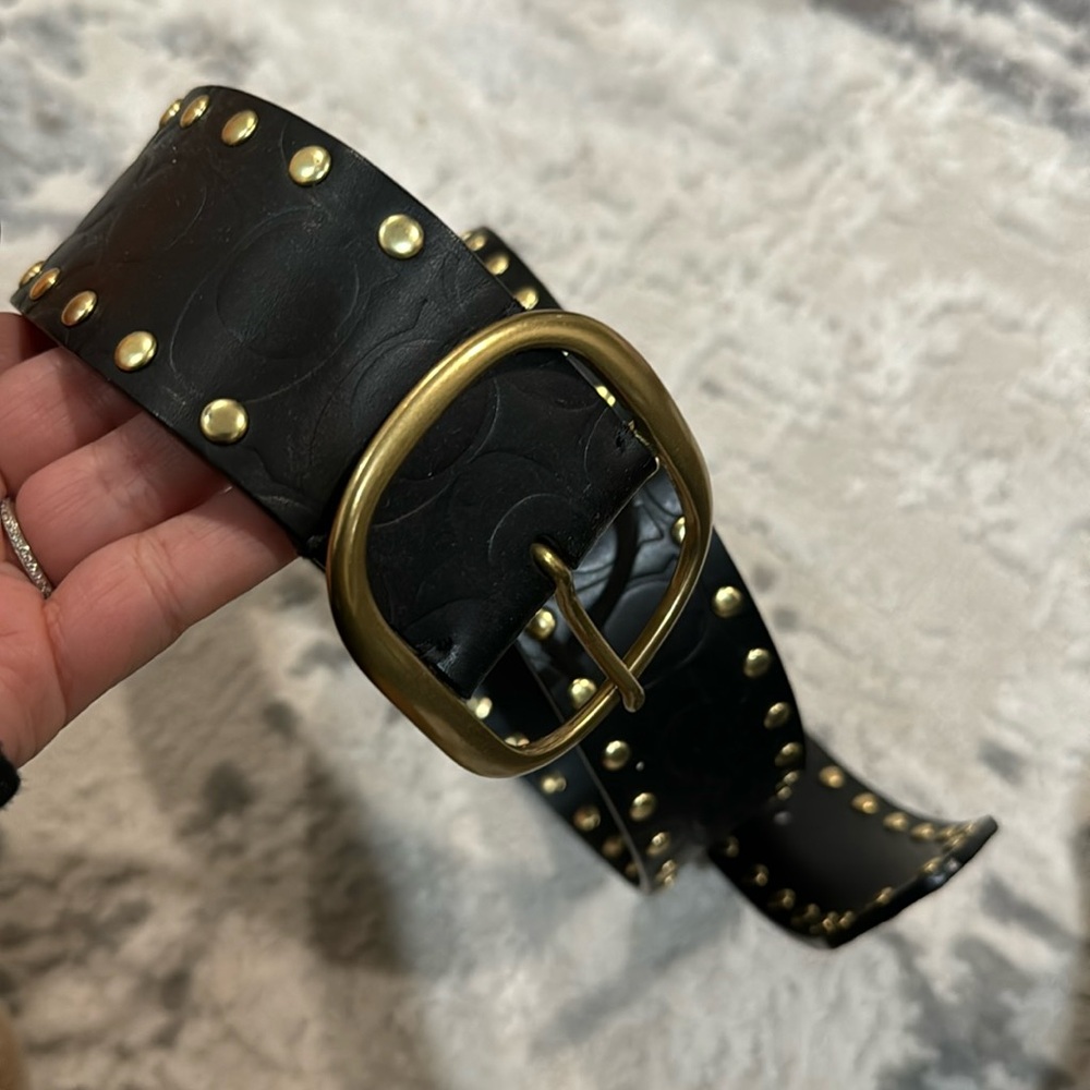 Black and gold studded coach belt